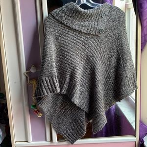 Dark grey/white sweater.